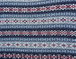 Fair Isle patronen, in drie banen komt het OXO-motief voor.