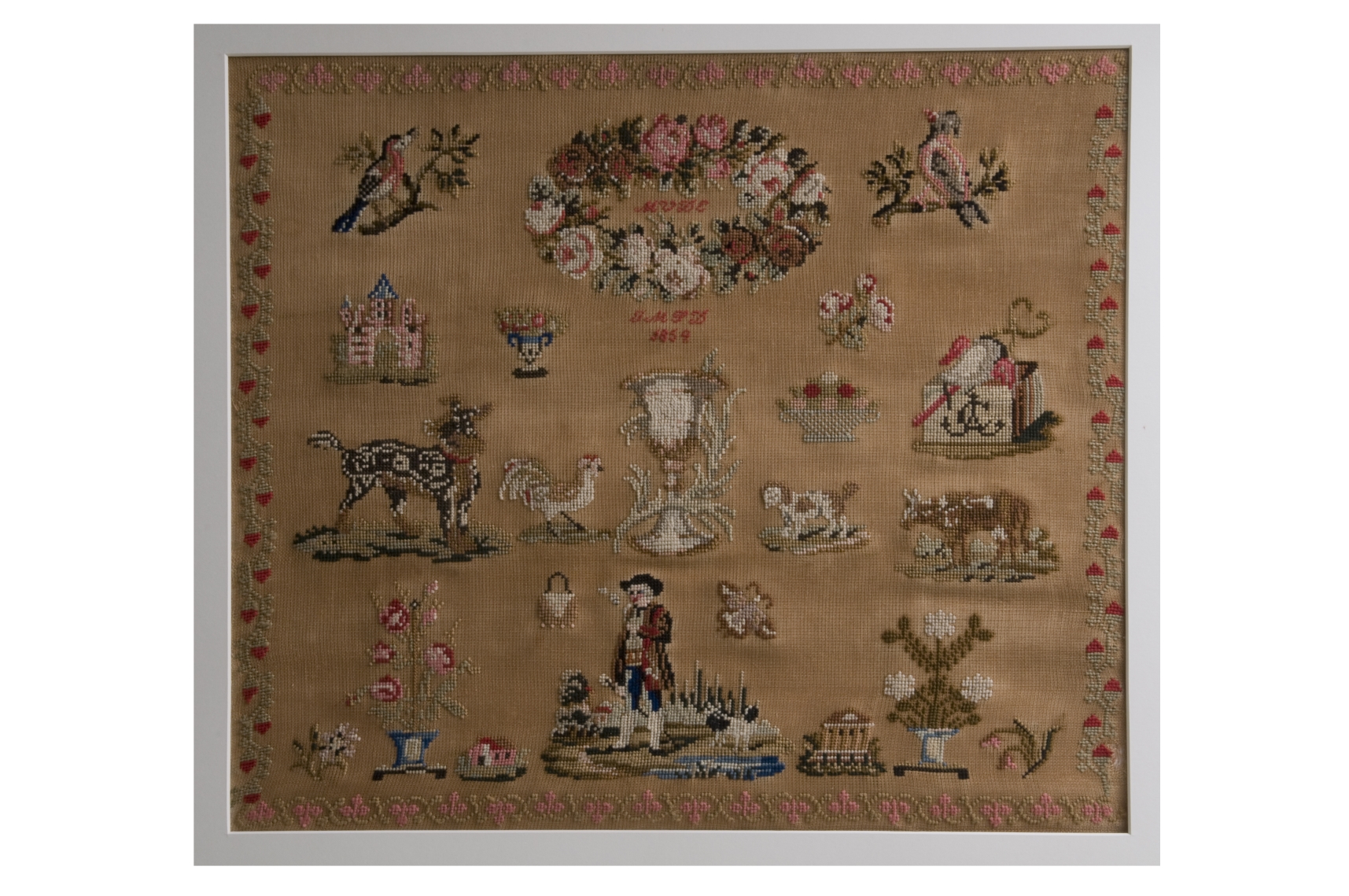 Borduurlap in Biedermeierstijl uit 1854 'MvdE', bruikleen Stadhuismuseum Zierikzee.