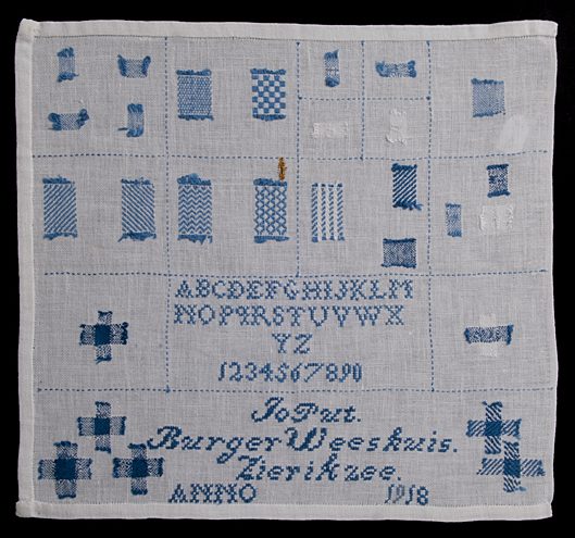 Stoplap uit 1918, door Jo Put in het Burger Weeshuis te Zierikzee gemaakt, bruikleen Stadhuismuseum Zierikzee.