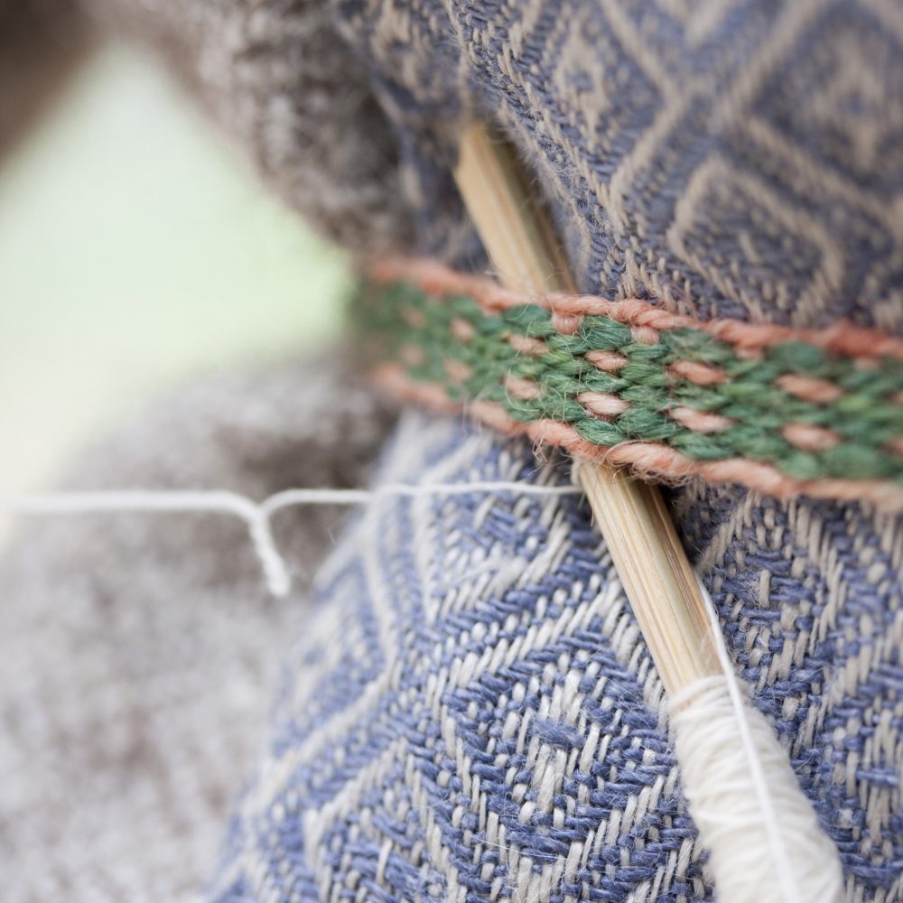 Detail van een geweven band.